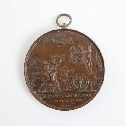 null Deux médailles en cuivre figurant Louis XVIII et Charles X. 

L'une commémorant...