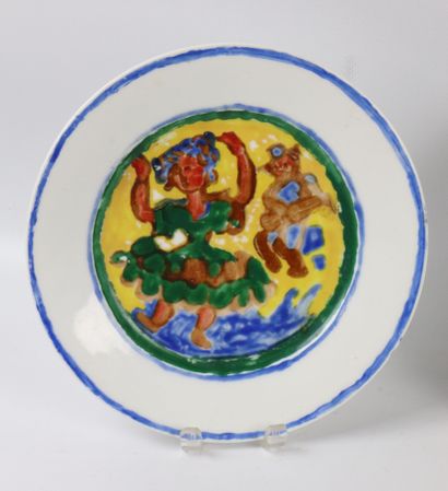 null Père CREIXAMS (1893-1965). 

Réunion de deux assiettes en porcelaine peinte...