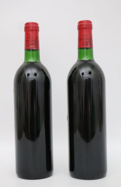 null CHATEAU L'EGLISE CLINET.
Millésime : 1986.
2 bouteilles, b.g
