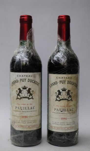 null CHATEAU GRAND PUY DUCASSE.
Millésime : 1986.
2 bouteilles, 1 b.g., e.f.s.