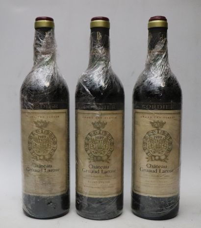 null CHATEAU GRUAUD-LAROSE. 
Millésime : 1989, 
3 bouteilles, 2 b.g., 1, h.e.