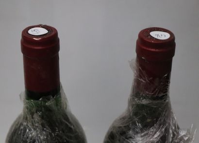 null CHATEAU HAUT MARBUZET.
Millésime : 1990.
2 bouteilles, une h.e., e.a., capsule...