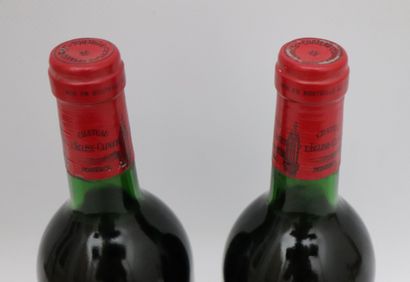 null CHATEAU L'EGLISE CLINET.
Millésime : 1986.
2 bouteilles, b.g