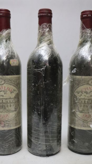 null CHATEAU DULUC.
Millésime : 1986.
3 bouteilles, 1 h.e., 1 b.g.