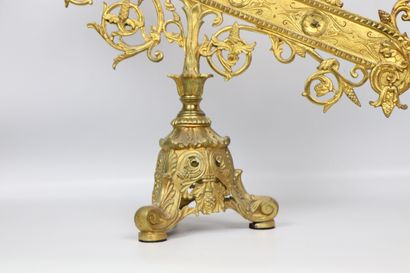 null Altar candlestick in gilt bronze with six lights. 
The arm of lights decorated...