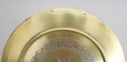 null Paten in vermeil decorated with the Christ mark surrounded by a frieze of vine...