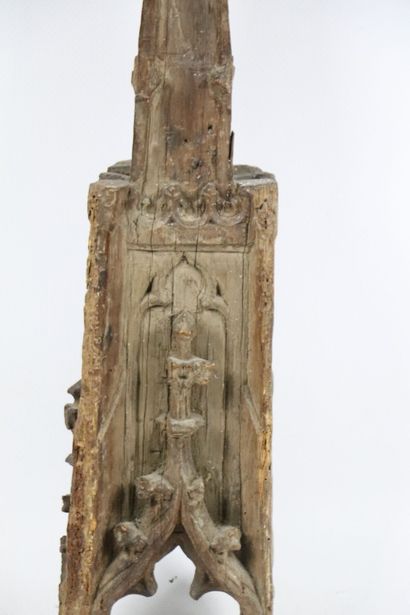null Element of altarpiece in natural wood carved forming an architectural spire.
18th...