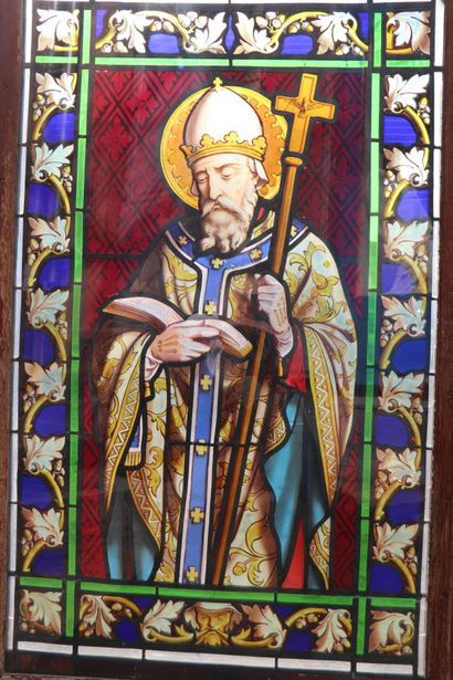 null Stained glass window representing a bishop blessing.
Framed with a door. 
19th...