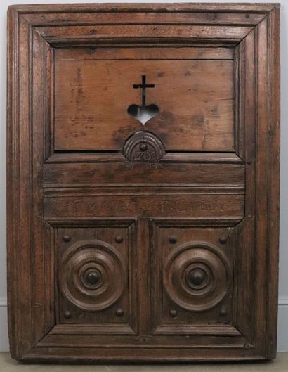 null Carved and openworked wooden panel with compartmentalized decoration. 
The upper...