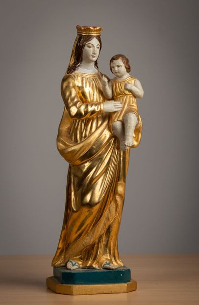 Vierge à l'enfant en bois stuqué polychrome...