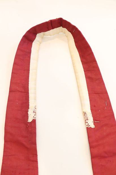 null Religious stole in red silk with gold braids. 
Decorated with golden crosses...