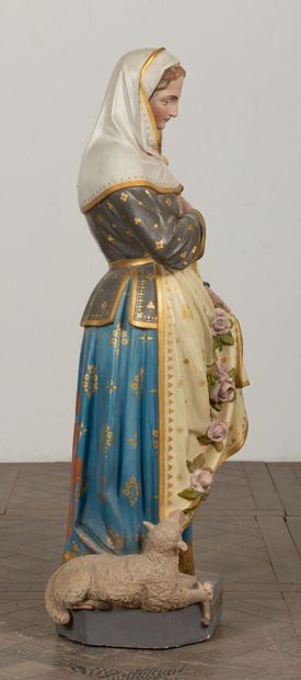 null Saint Germaine in polychrome terracotta.
Her dress lets roses fall down to her...