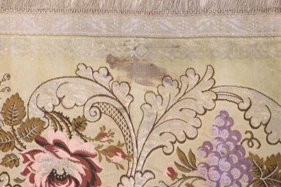 null Meeting of two embroidered hangings with floral and vine decorations, one depicting...