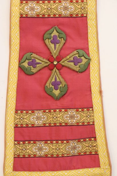 null Religious stole in pink fabric and braids. 
Adorned with an embroidered cross...