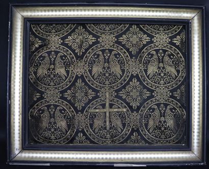 null Hanging embroidered with gold thread on black background with compartmentalized...