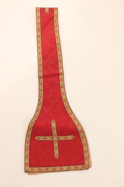 null Two religious stoles in red silk fabric and braids. 
Decorated with a cross...