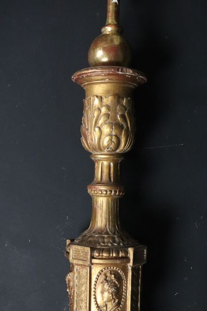 null Cross in carved and gilded wood. 
The cross surmounting a globe. 
The shaft...