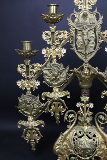 null Altar candlestick in bronze and gilded metal. 
It illuminates with five lights....