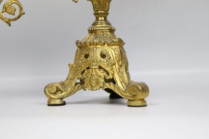 null Altar candlestick in gilt bronze with six lights. 
The arm of lights decorated...