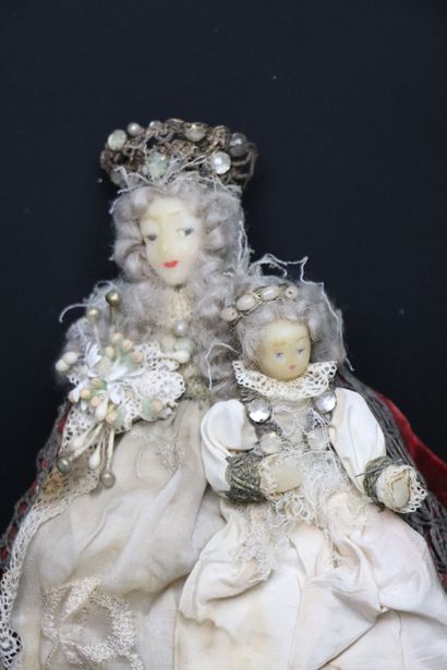 null The Holy Virgin and the Child Jesus.
Wax figures, they are richly dressed with...