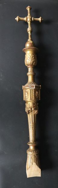 null Cross in carved and gilded wood. 
The cross surmounting a globe. 
The shaft...