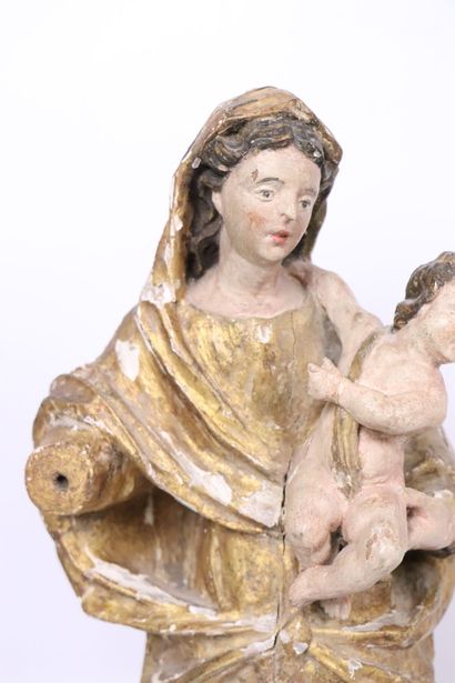null Ecole française du XVIIIème siècle. 
Vierge à l'enfant.
Sculpture en bois et...