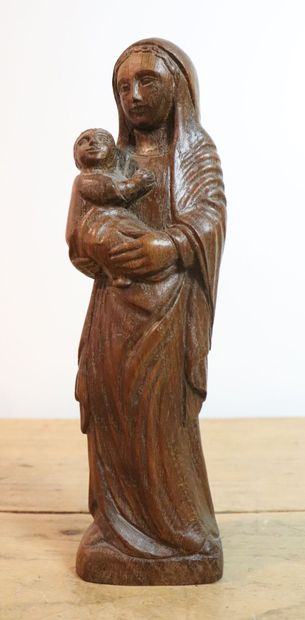 null Lucien PESSEY (1912-1990).
Vierge à l'enfant en bois sculpté. 
Signé sur la...