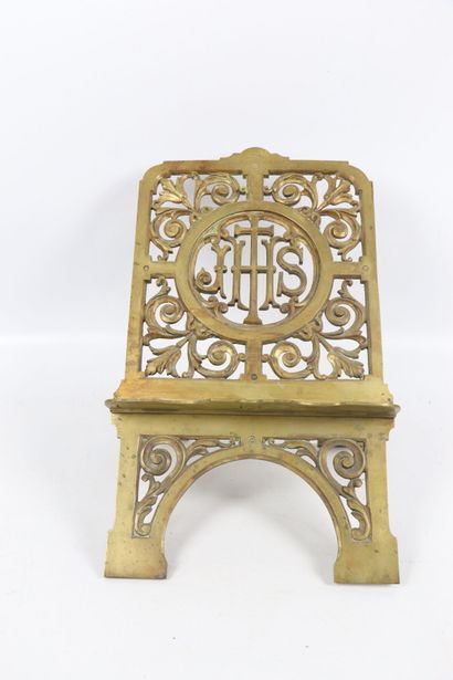 null Gilt bronze lectern decorated with a cross and the inscription IHS in a frame...