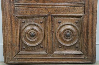 null Carved and openworked wooden panel with compartmentalized decoration. 
The upper...