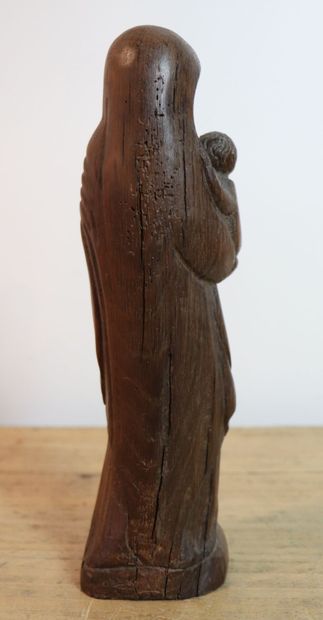 null Lucien PESSEY (1912-1990).
Virgin and child in carved wood. 
Signed on the base.
H_27,1...