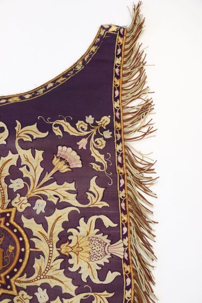 null Embroidered apron and two hangings decorated with thistles holding a coat of...