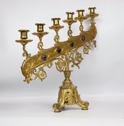 null Altar candlestick in gilt bronze with six lights. 
The arm of lights decorated...