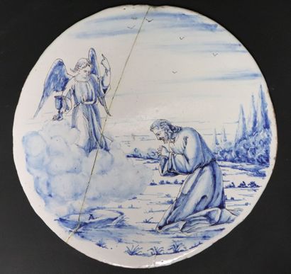 null NEVERS. 
Pair of circular earthenware plates with white glaze and blue decoration...