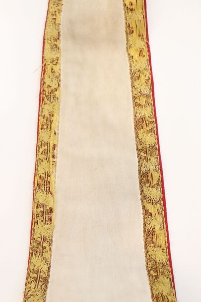 null Religious stole in white fabric, gold braids and red reverse. 
Adorned with...