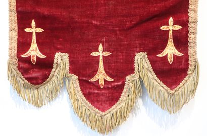 null Religious banner in red velvet decorated with an embroidered medallion showing...