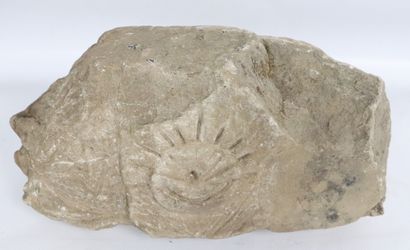 null Sandstone architectural elements decorated with a fantastic creature, a sundial...