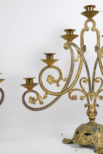 null Pair of candlesticks in gilded metal, openwork and partially painted. 
They...
