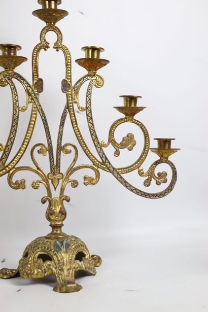 null Pair of candlesticks in gilded metal, openwork and partially painted. 
They...