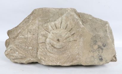 null Sandstone architectural elements decorated with a fantastic creature, a sundial...