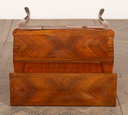 null Rosewood marquetry "bonheur-du-jour" desk with a décor of moving reserves in...
