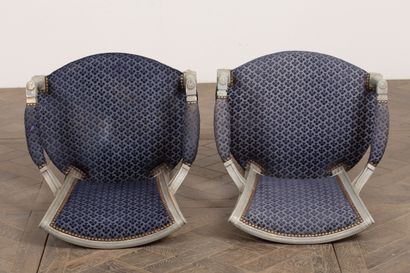 null Pair of cabriolet armchairs in molded and carved wood, grey lacquered.
Directoire...