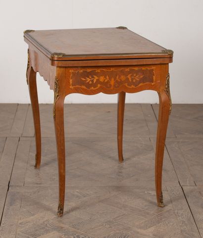 null Wood veneer and gilt bronze marquetry game table. 
Napoleon III period. 
H_77,5...