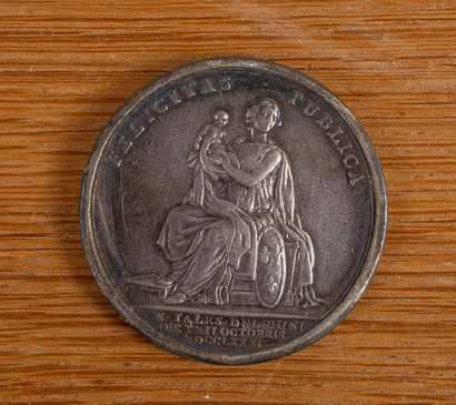 null Jean DUVIVIER (1687-1761).
Médaille en argent commémorant la Naissance du dauphin....