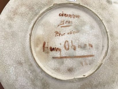 null Henry OHREN
Plat sur talon en céramique à décor d'une femme
D : 32,5 cm. (éclats...