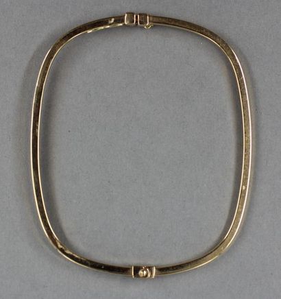 null *Bracelet rigide articulée en or jaune 18k, pds : 3,9 g.
