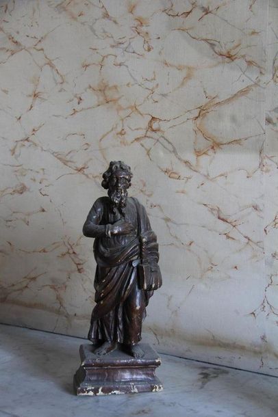 null Statuette en bois laqué marron représentant un Saint
H : 37 cm.