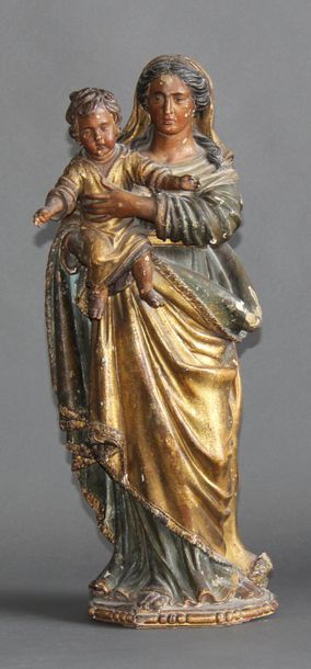 null Sculpture en bois polychrome représentant la Vierge à l'enfant
H : 50 cm. (...