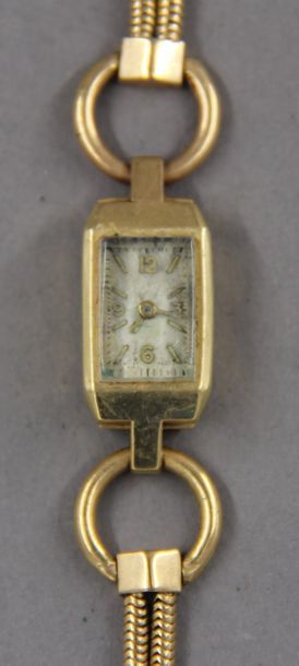 null Bracelet-montre de dame en or jaune 18k à bracelet double lanières, pds brut...