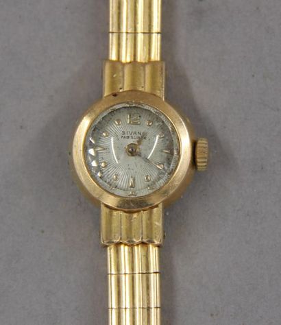 null SIVANE
Bracelet-montre de dame en or jaune 18k, pds brut : 23,2 g.