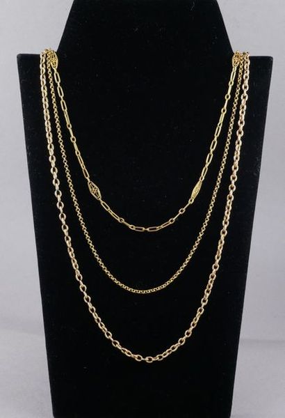 null *Three neck chains and one chain element in 18k yellow gold, pds: 10.9-7.7-10.2...